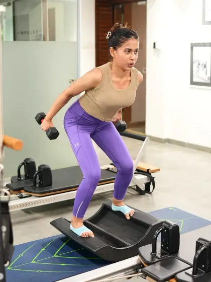 A bent-over row with perfect form. This exercise is fantastic for strengthening the muscles of the upper back, which helps to improve posture and reduce shoulder and neck tension.