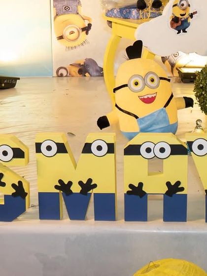 Custom Minion-themed name blocks for Vismaya's birthday. Planning this party virtually for her NRI parents was a wonderful experience, and seeing it all come together was incredibly rewarding.
