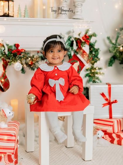 A perfect Christmas portrait. This little lady is all dressed up and ready to celebrate the season in our festive studio.