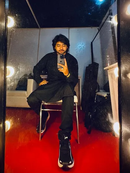 A pre-gig mirror selfie, reflecting on the music to come.