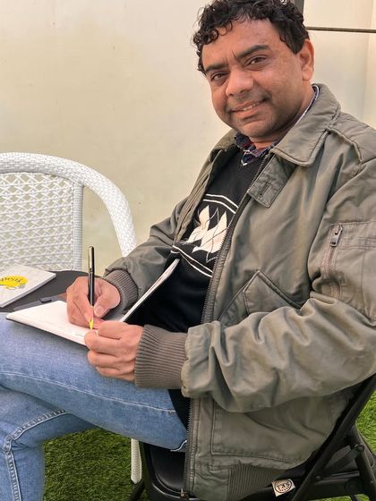 A participant at our 'Dead Poet Society' themed workshop, writing in our sunny studio space. We provide a comfortable and inspiring setting for your creativity to flow.