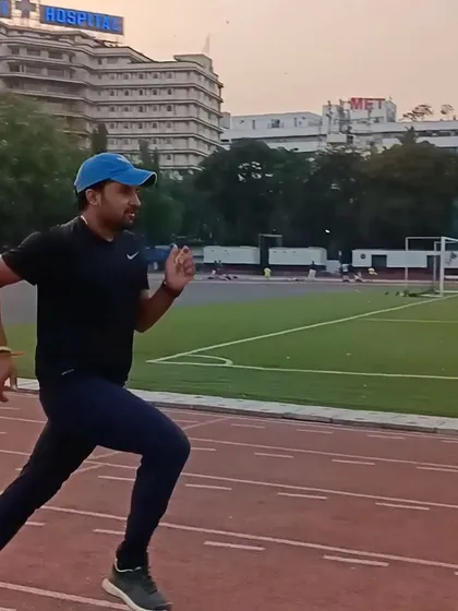 A shot of me running on the track, practicing what I preach.