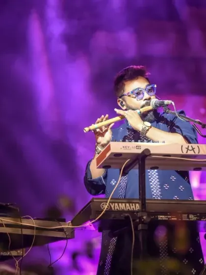 Our multi-talented musician on the flute and keyboard, adding layers of melody and soul.