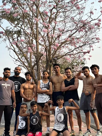 Our training isn't confined to the gym. We are a community that finds strength and beauty everywhere, like this morning session with the Vikhroli cherry blossoms. This is the calisthenics lifestyle.
