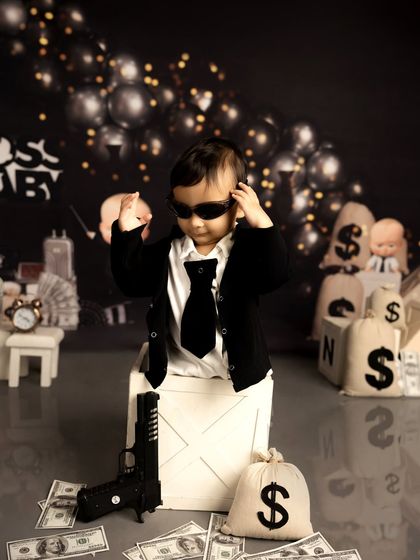 A full shot of the 'Boss Baby' setup, showing the coordinated props and background. I ensure every detail is perfect to bring your chosen theme to life in my studio.