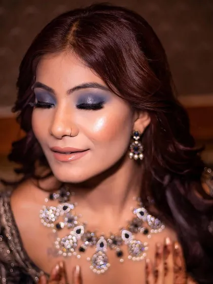Midnight beauty. This close-up shows the details of a dramatic blue smokey eye, perfect for a glamorous evening look.