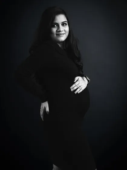 There is a timeless elegance to a classic black and white portrait. This moody, low-key style uses dramatic lighting to create a simple yet powerful image that focuses entirely on you and your journey.