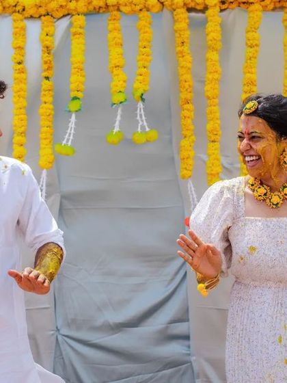 A duplicate of 45, capturing the couple's joyful dance at their Haldi.