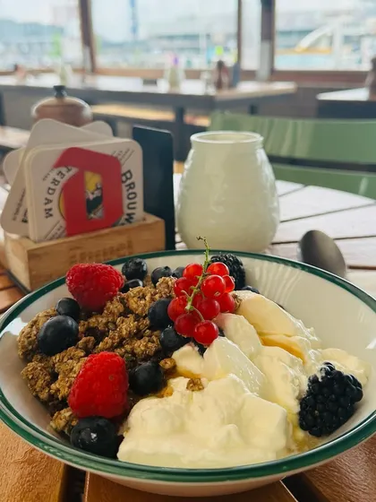 This is what my breakfast looks like, even when I'm traveling in Amsterdam. A simple, delicious bowl with granola and fresh berries. This lifestyle is my passion, and it’s the inspiration behind every FITNUT meal I create.
