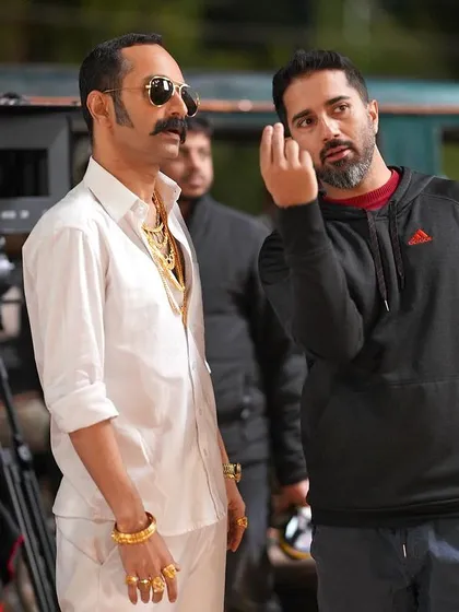 On the set of 'Aavesham', I'm breaking down a scene with the incredible Fahadh Faasil. My job is to translate the director's vision into raw, believable action that serves the story. This is where the magic begins.