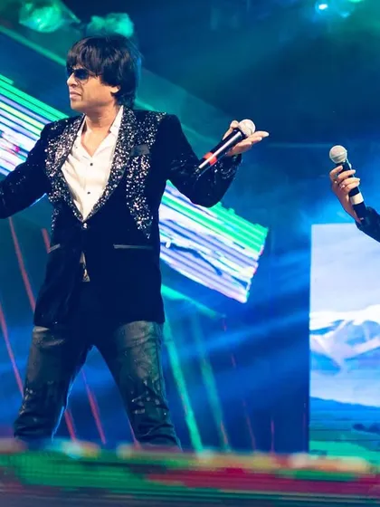 Sharing the stage with my co-singer at the Medinipur festival. We had an incredible time performing for the wonderful audience.