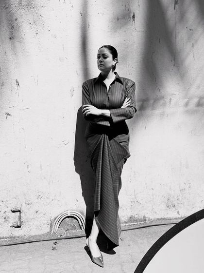 A dramatic black and white photo that emphasizes the unique silhouette and the play of light and shadow.