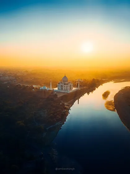 A slightly different crop of my iconic Taj Mahal drone shot. This version emphasizes the warm, golden tones of the sunset and the peacefulness of the scene.
