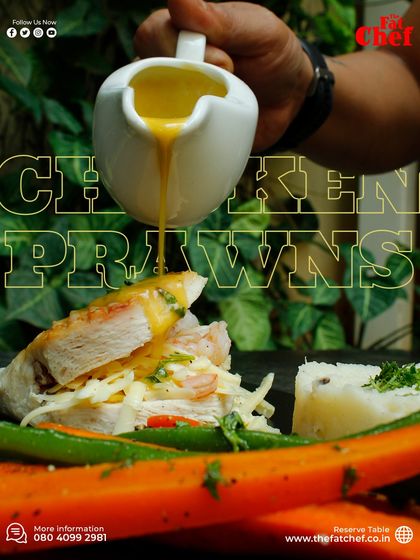 A mouthwatering combination of chicken, prawns, and cheese. This stuffed chicken breast is drizzled with a creamy sauce and served with rice and veggies.