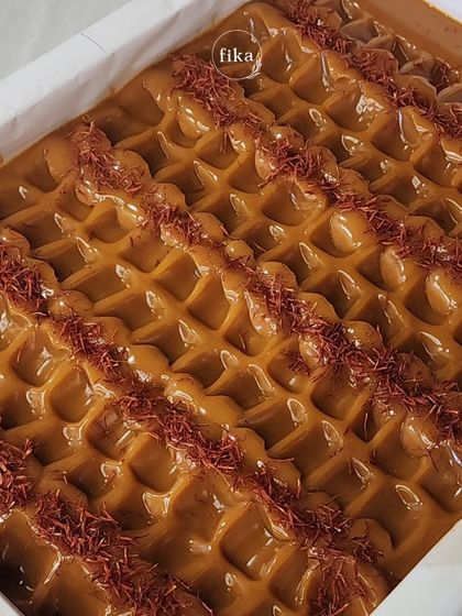 This is a close-up of my Turmeric Saffron soap loaf, a consistent top-seller for my wholesale partners. The rich color comes from turmeric, and the red strands are pure saffron, offering both visual appeal and skin-brightening benefits.