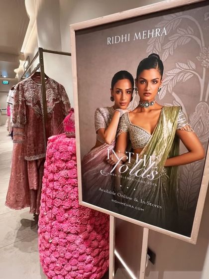 The official campaign poster at the Ridhi Mehra event. I use brand assets and create floral arrangements that reinforce the collection's theme, ensuring a cohesive and beautiful atmosphere.