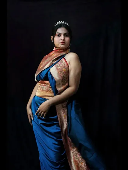 Taking a traditional piece and giving it a completely new life is my specialty. I transformed this beautiful Banarasi saree into a modern, chic halter-neck draped outfit. This is a great example of how we can restyle your existing wardrobe for a fresh, contemporary look.