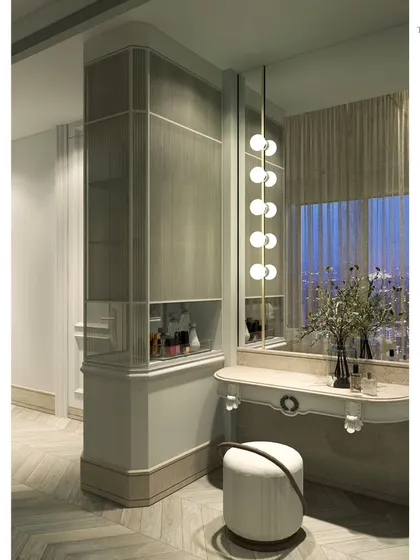 A view of the dressing area in the neo-classical bedroom. The design features a classic vanity table, a modern globe pendant light, and custom cabinetry with glass fronts, all aligning with themes of zen and minimalism.