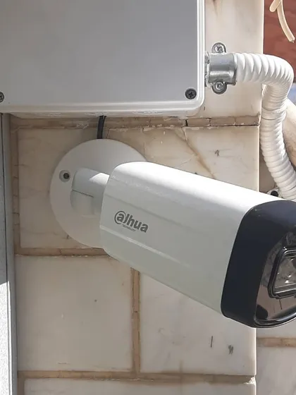 Another example of a clean and secure Dahua camera installation. The junction box keeps all connections safe, which is a critical part of our professional installation standard.