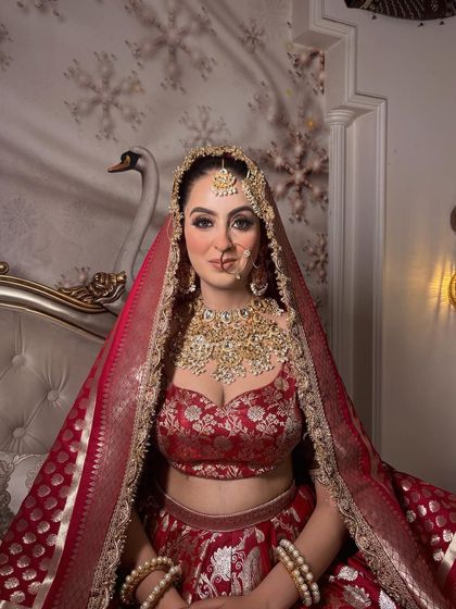 The complete picture of elegance. This bride looks absolutely serene and beautiful, showcasing how the right makeup can bring the entire bridal look together.