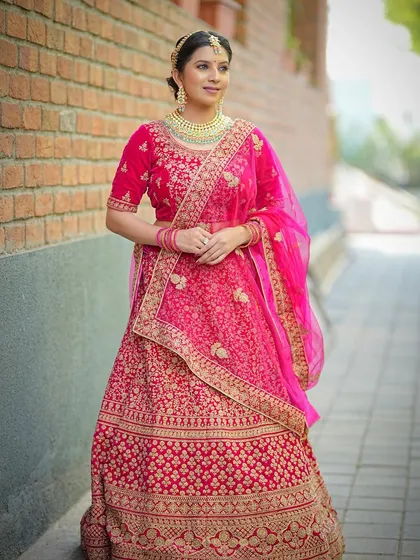 A full-length view of the pink bridal lehenga, a perfect inspiration for brides.