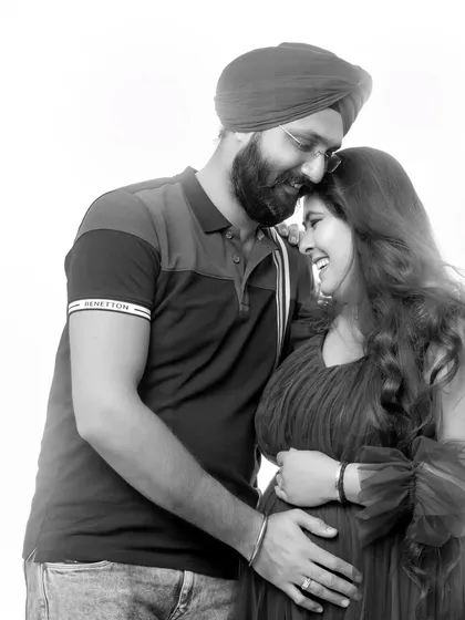 I often convert my favorite color photos to black and white to offer a different mood. This version emphasizes the joy and laughter between the couple, creating a timeless memory.