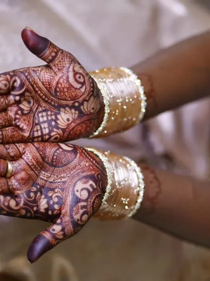 A close-up of a stunningly dark engagement mehndi stain. The intricate details, from the delicate birds to the fine lines, hold their shape perfectly thanks to the smooth texture of my henna paste.