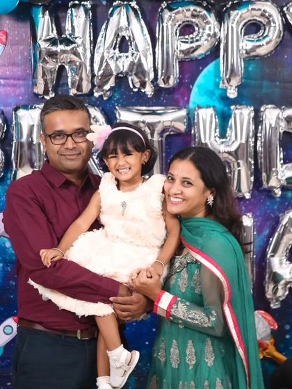 A charming 'Baby Boss' themed birthday party, with a sophisticated black and white color scheme, custom props, and a stylish backdrop, perfect for a little executive.