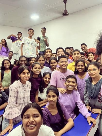 Our students and mentor dressed in purple for Day 8 of Navratri 2023, symbolizing power and ambition.