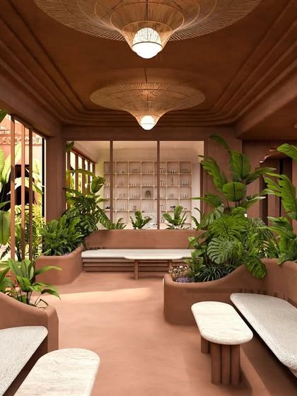 Another view of the waiting lounge, with its woven pendant lights and comfortable seating nestled among the greenery.