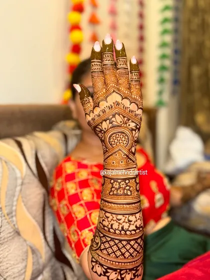 A side view of the bridal backhand, showing how the design wraps around the arm.