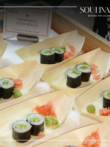Asparagus Sushi Rolls served in eco-friendly leaf-shaped plates. A demonstration of our commitment to both elegant presentation and sustainability.
