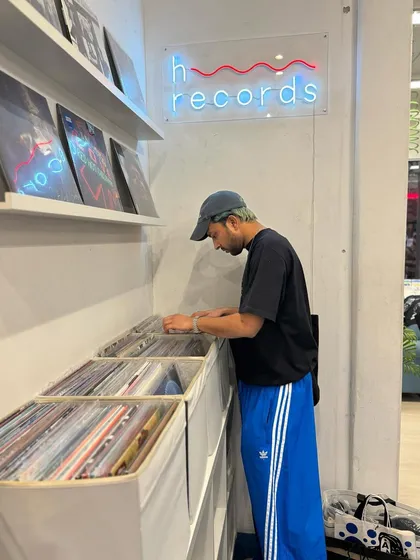 Digging for gems at H Records. There's nothing like the feeling of finding a rare vinyl to add to the collection.