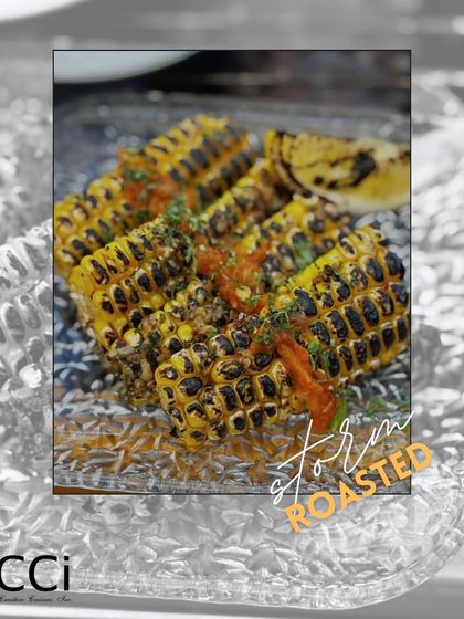 A monsoon favorite, reimagined. Our 'Storm Roasted' corn is grilled to perfection, charred for a smoky flavor, and topped with a fresh, tangy salsa, offering a sophisticated twist on classic roasted corn on the cob.