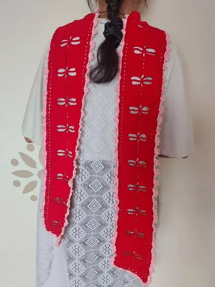 The back view of the Aerith Scarf, highlighting the repeating dragonfly pattern.