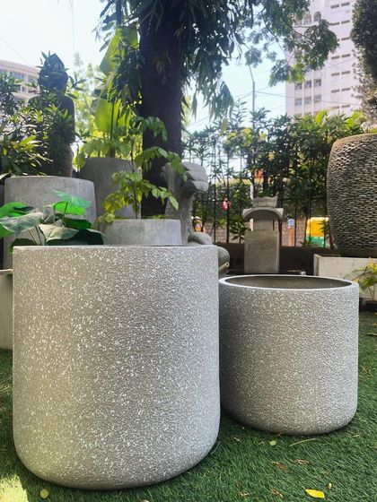 This pair of cylindrical planters from my FRP range showcases the material's stone-like appearance while being lightweight and durable.