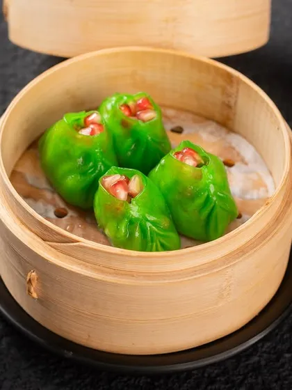 Bright green dumplings that immediately catch the eye. Strong, clean photography ensures these colorful items look appetizing, not artificial.