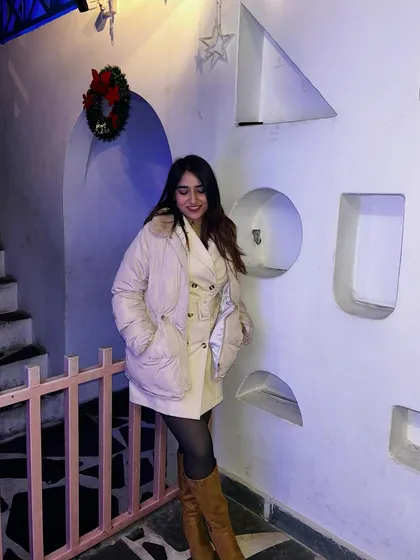 The full winter look with the puffer jacket. This is a great example of a stylish and practical winter outfit.