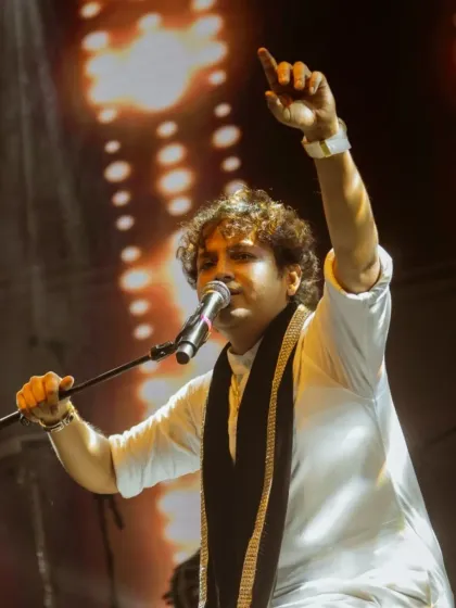Our lead vocalist reaching for a high note at the Taj Vivanta show.