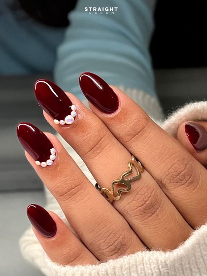 A close-up of the delicate pearl detailing. It's a simple addition that makes a huge impact, elevating the entire look.