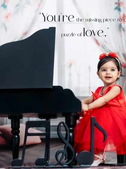 You're the missing piece to our puzzle of love. A sweet girl in a red dress stands by her piano in our romantic, floral studio.