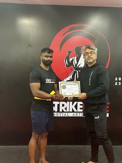 Another student is awarded his yellow belt, showing the growth and development across our member base.