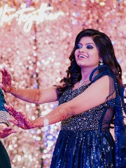 Be the bride who dances the most at her own wedding. This bride is having the time of her life at her sangeet, and her bold, glamorous makeup is staying put.