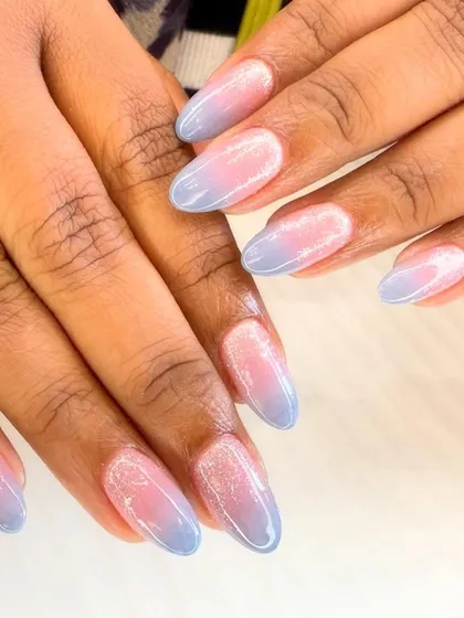 A dreamy pastel ombre design. This set features a soft blend of baby blue and pink with a subtle glittery finish, creating a romantic and ethereal look.