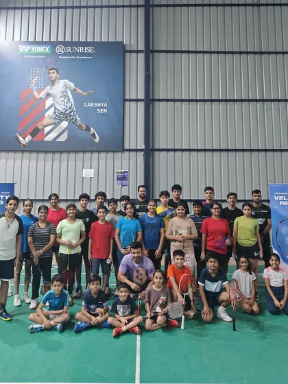 A group photo of my enthusiastic students and coaches during a special Yonex Demo Day. I believe in building a strong community where players can learn, grow, and share their passion for the sport together.