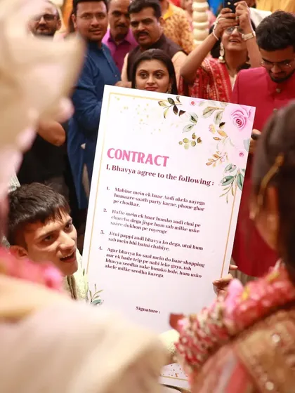 The groom's friends presenting the bride with a hilarious "contract" to sign. These funny, personal touches make a wedding unique.