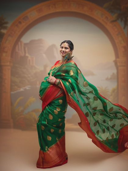 Creating this stunning image was a journey in itself. The elegance of her traditional green saree and the symbolism of the peacock feather feel frozen in time.