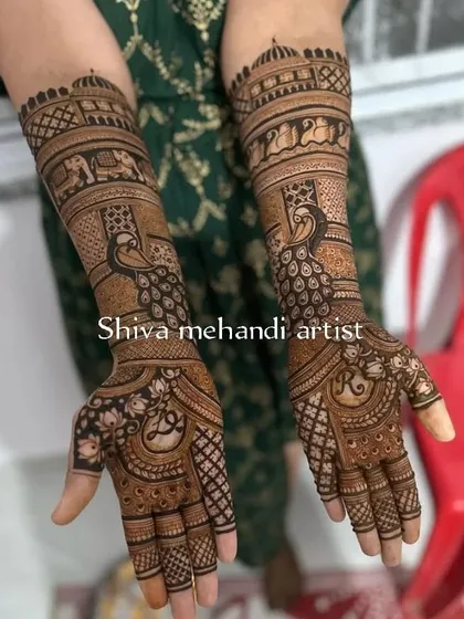 The peacock is a timeless motif in Indian mehendi, and here I have created a bold design that covers the full arm. I use fine lines and shading to make the peacocks and surrounding patterns stand out.