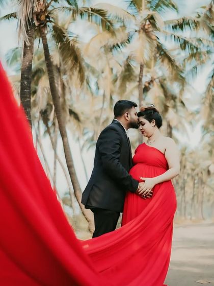 A classic choice for a reason. This red georgette infinity gown with a long trail is one of our most popular rentals for both maternity and pre-wedding shoots.