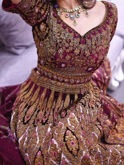 A close-up of the intricate embroidery on one of my signature bridal lehengas. Every stitch is a story of tradition and luxury, designed to make your wedding day perfect.